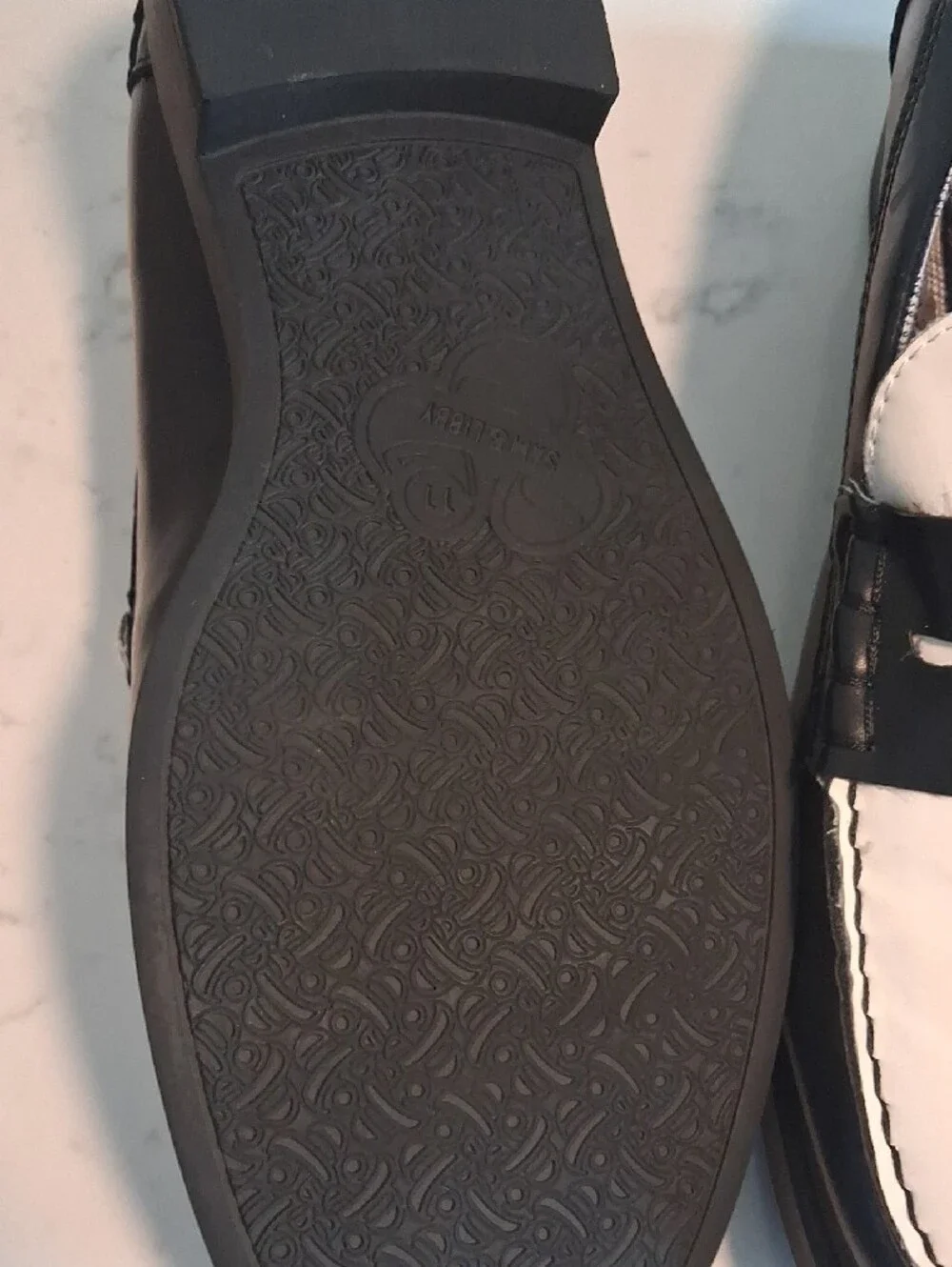 Sam & Libby Two-Tone Black and White Penny Loafers